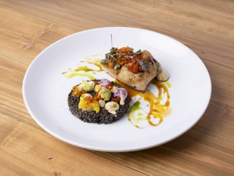 Gourmet dish served at La Quinta Resort & Club, featuring a beautifully plated entrée with colorful.