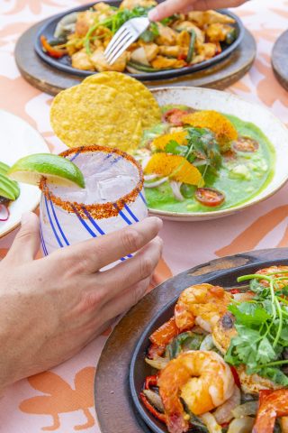 Mexican cuisine, seafood, and cocktails served in a vibrant setting.