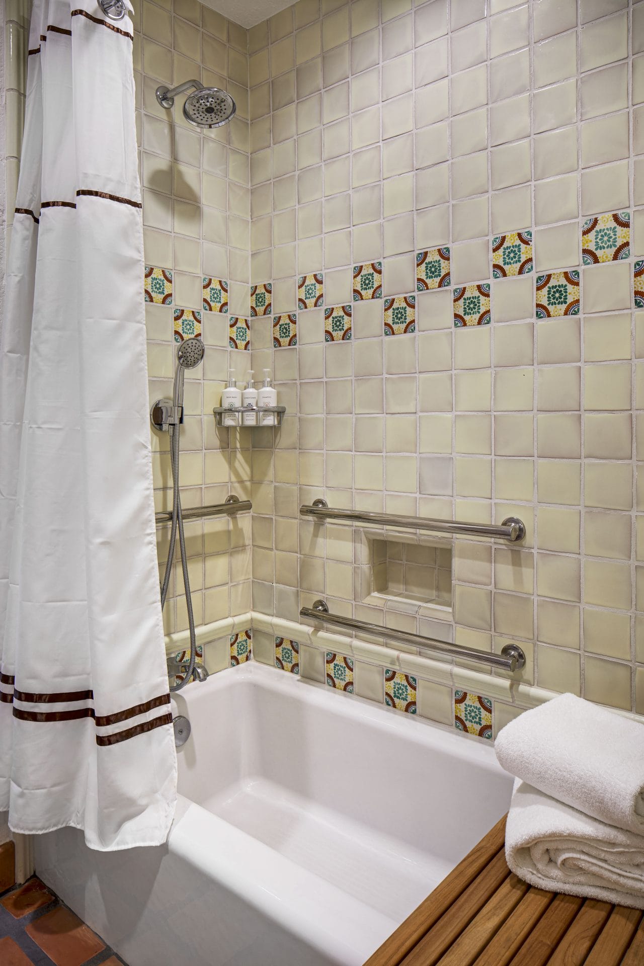 Accessible bathroom with roll-in shower and notification devices at La Quinta Resort & Club.