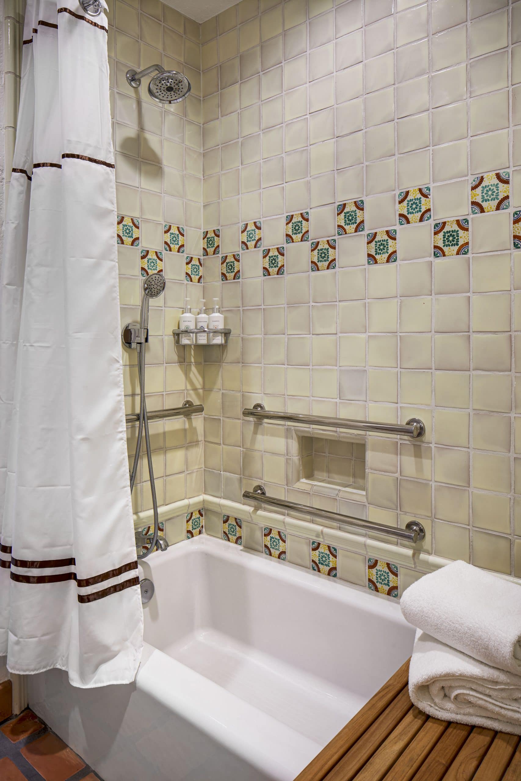 Accessible bathroom with roll-in shower and notification devices at La Quinta Resort & Club.