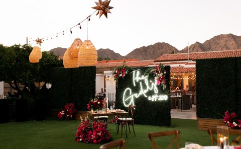 Beautiful wedding reception area with floral decor and ambient lighting.