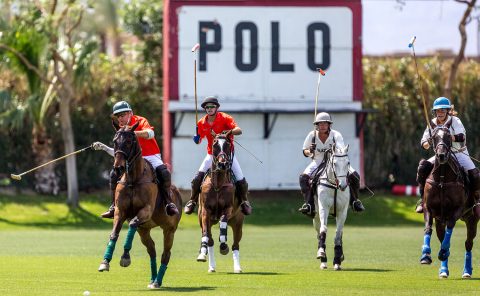 Group of people playing polo at La Quinta Resort & Club during spring.