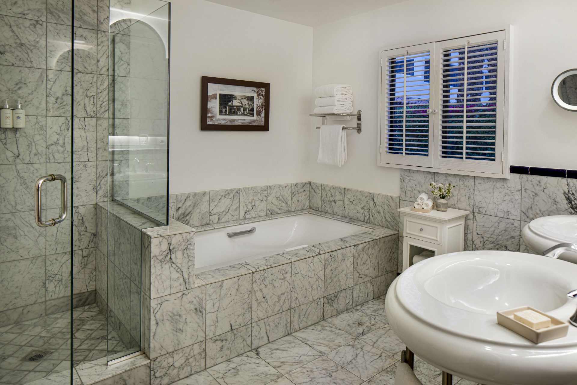 Spacious bathroom with marble finishes in the Two-Bedroom Arzner Suite at La Quinta Resort & Club.