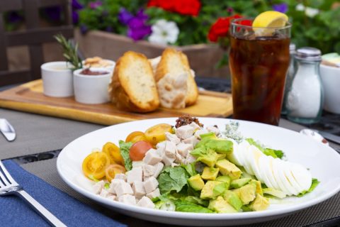Fresh garden salad with chicken, avocado, and onions at La Quinta Resort & Club.