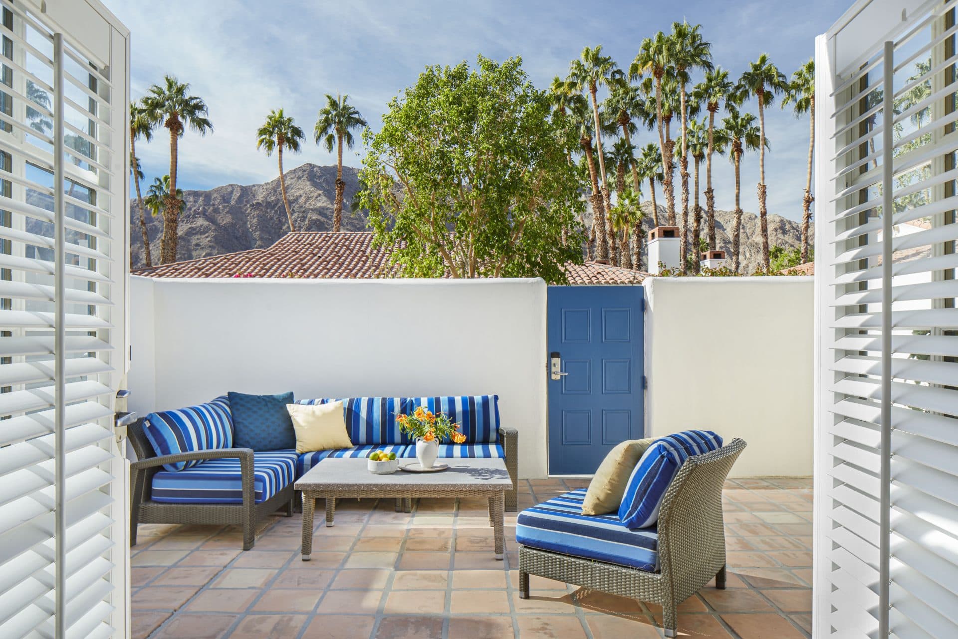 Deluxe King Casita with private patio at La Quinta Resort & Club, featuring outdoor seating and scen.