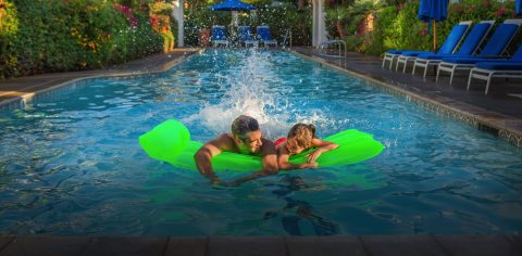 Family enjoying a swim in the La Quinta Resort & Club pool.