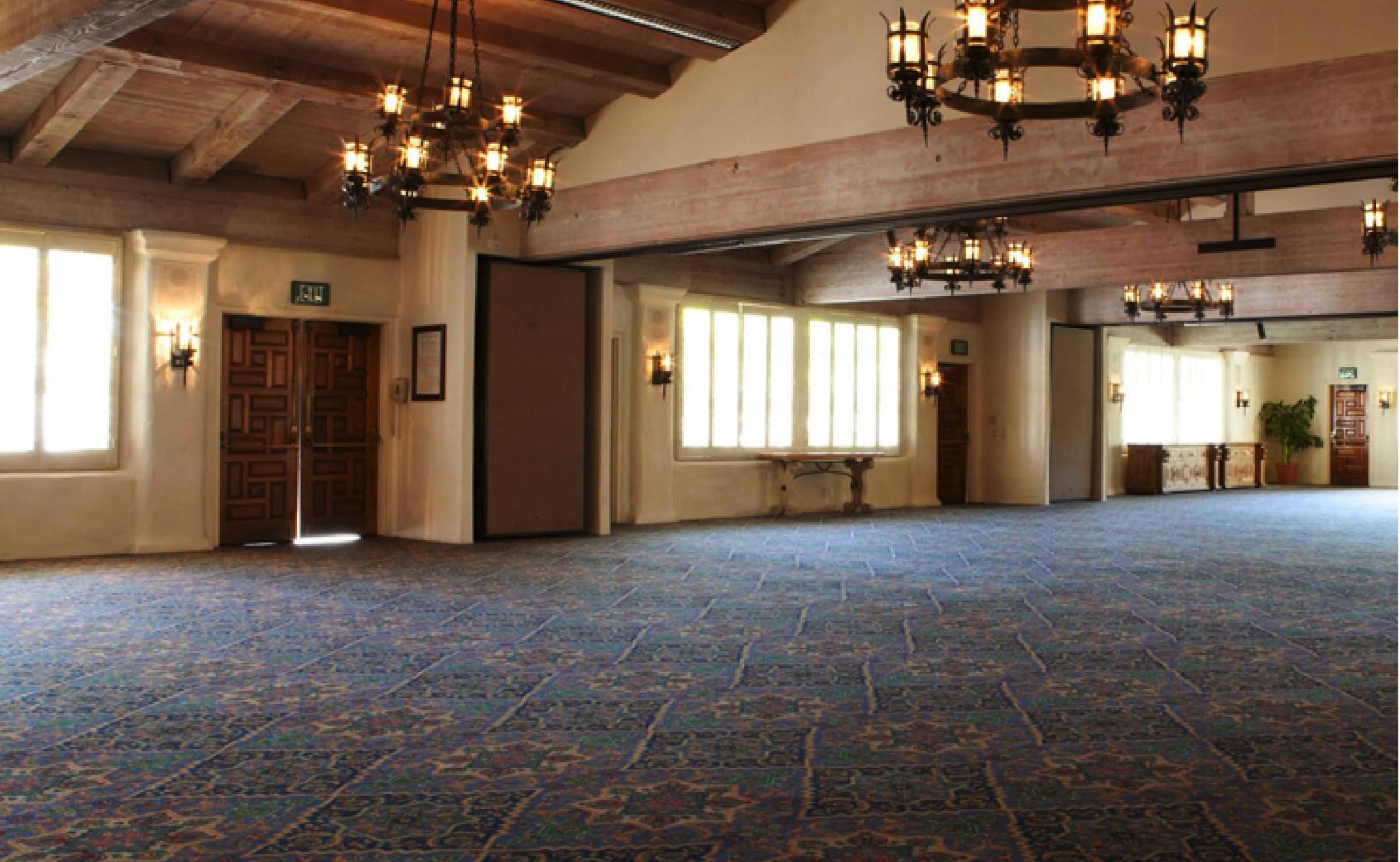 Spacious ballroom at La Quinta Resort & Club, ideal for wedding receptions and events.