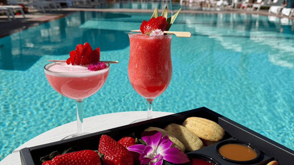 Elegant cocktails with fresh strawberries by the poolside. Perfect for relaxing at La Quinta Resort.