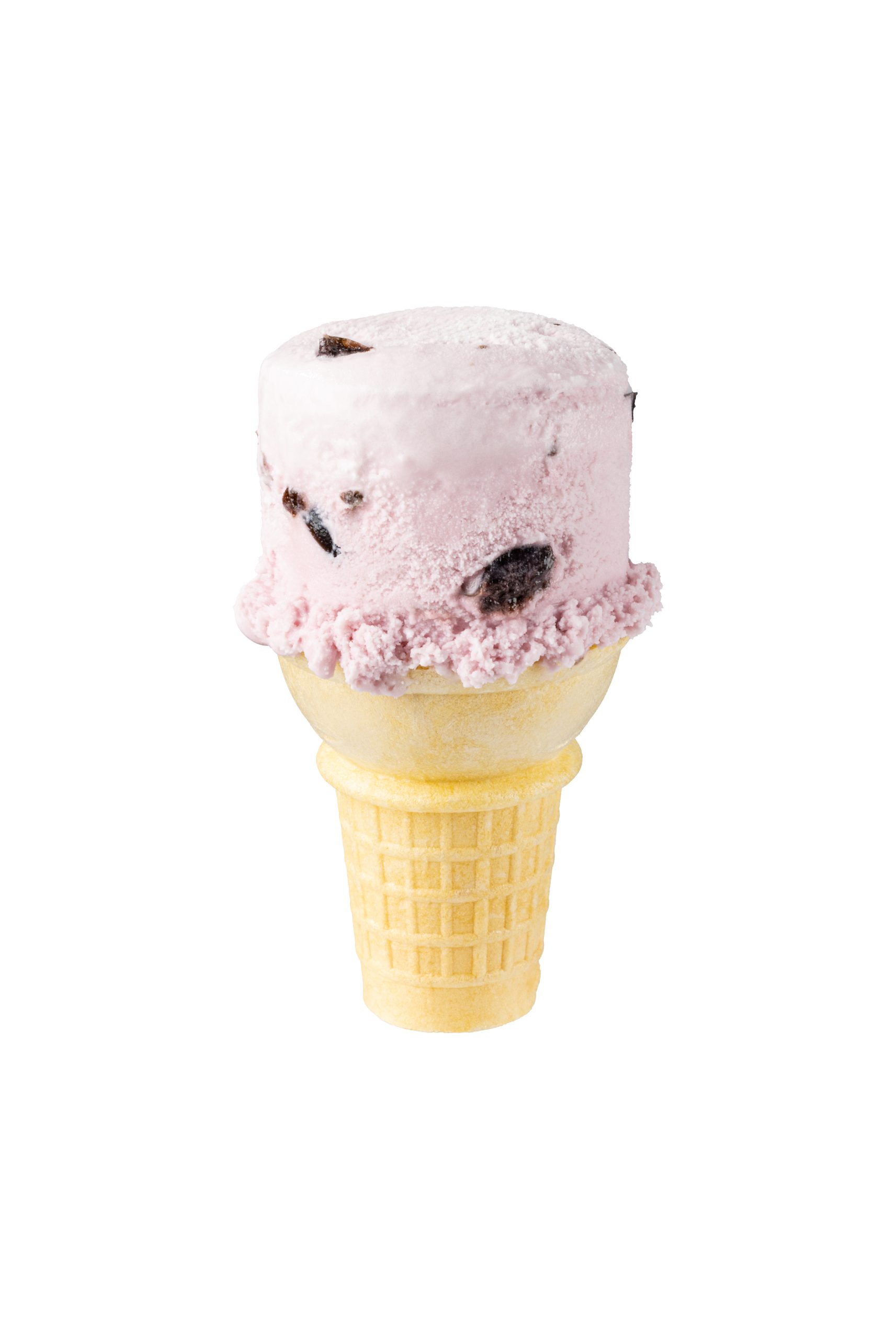 Delicious pink berry ice cream cone with chocolate chips, served in a waffle cone at La Quinta Resor.