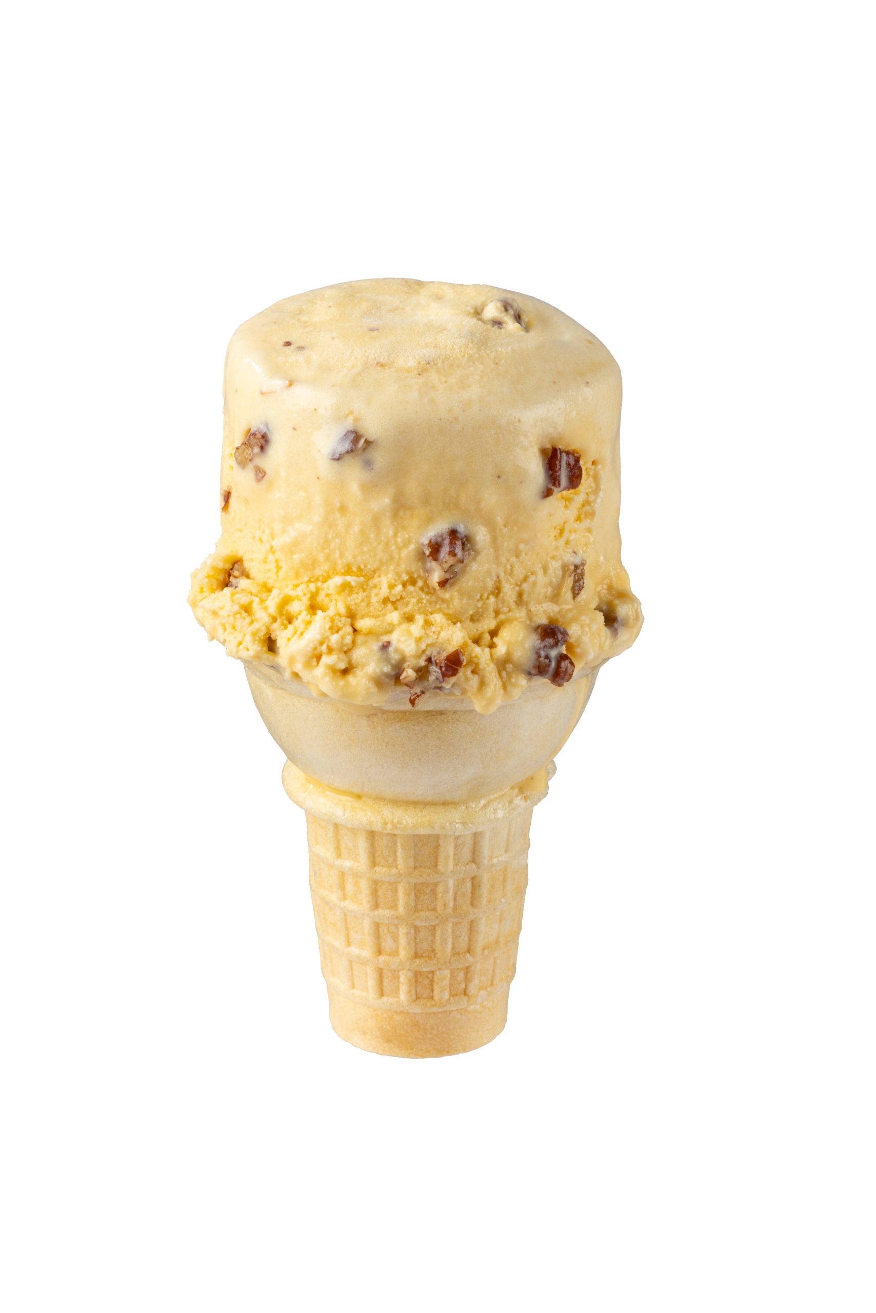 Ice cream cone with cookie dough flavor and chocolate chips, served in a waffle cone.
