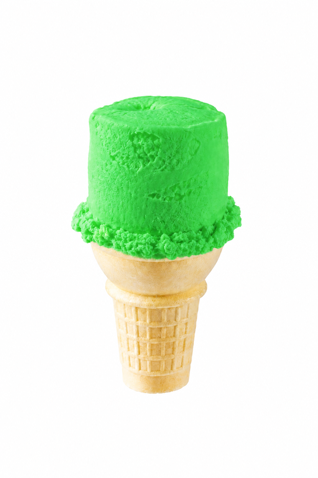 Bright green lemon lime ice cream in a waffle cone on white background.