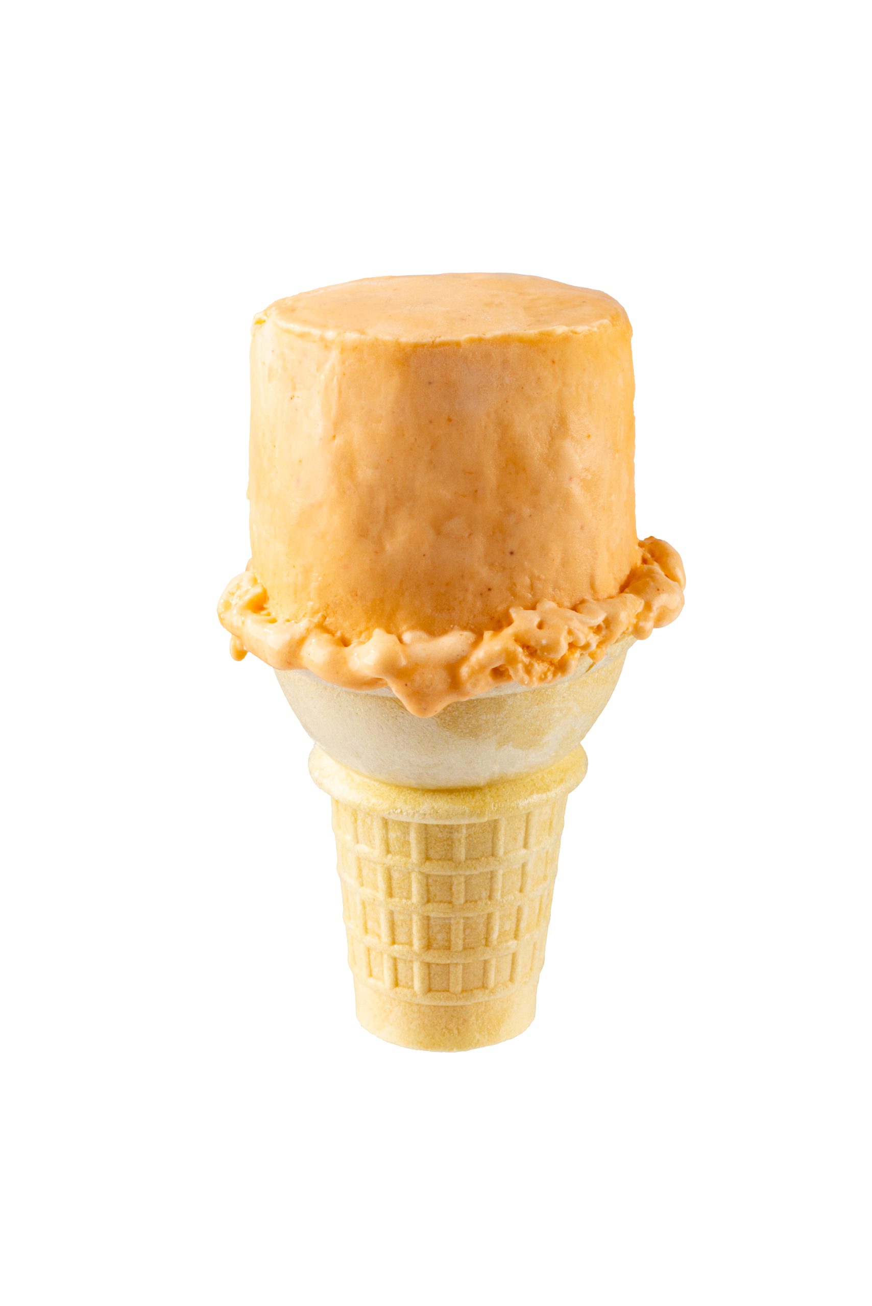 Delicious ice cream cone with a scoop of caramel-flavored ice cream.