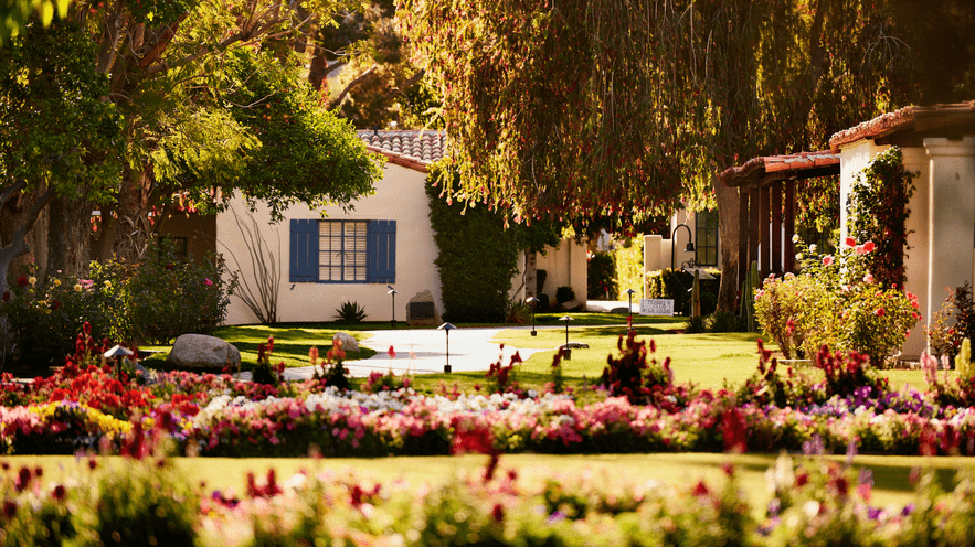 Beautiful garden view at La Quinta Resort & Club with lush greenery and colorful flowers.