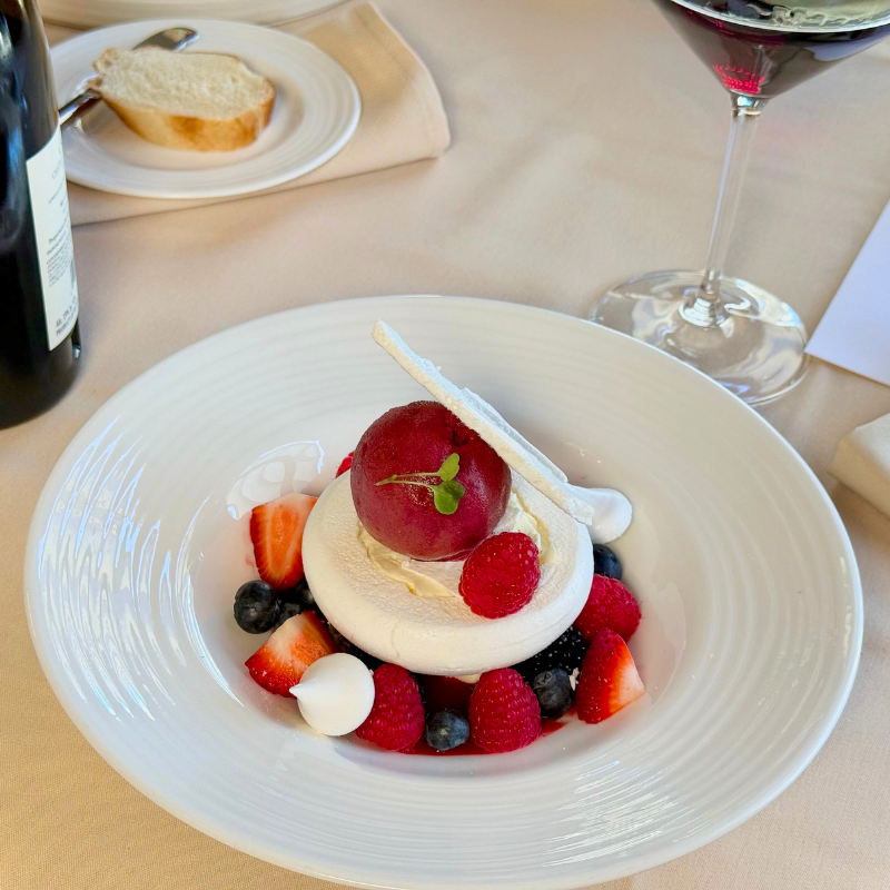 Gourmet dessert with berries and cream at La Quinta Resort.