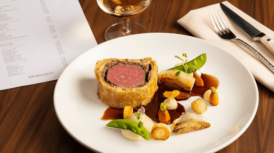 Elegant Beef Wellington dish served at La Quinta Resort & Club.
