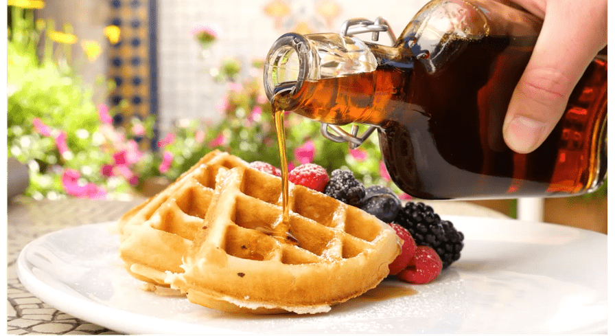 Waffles with syrup and berries at La Quinta Resort breakfast.