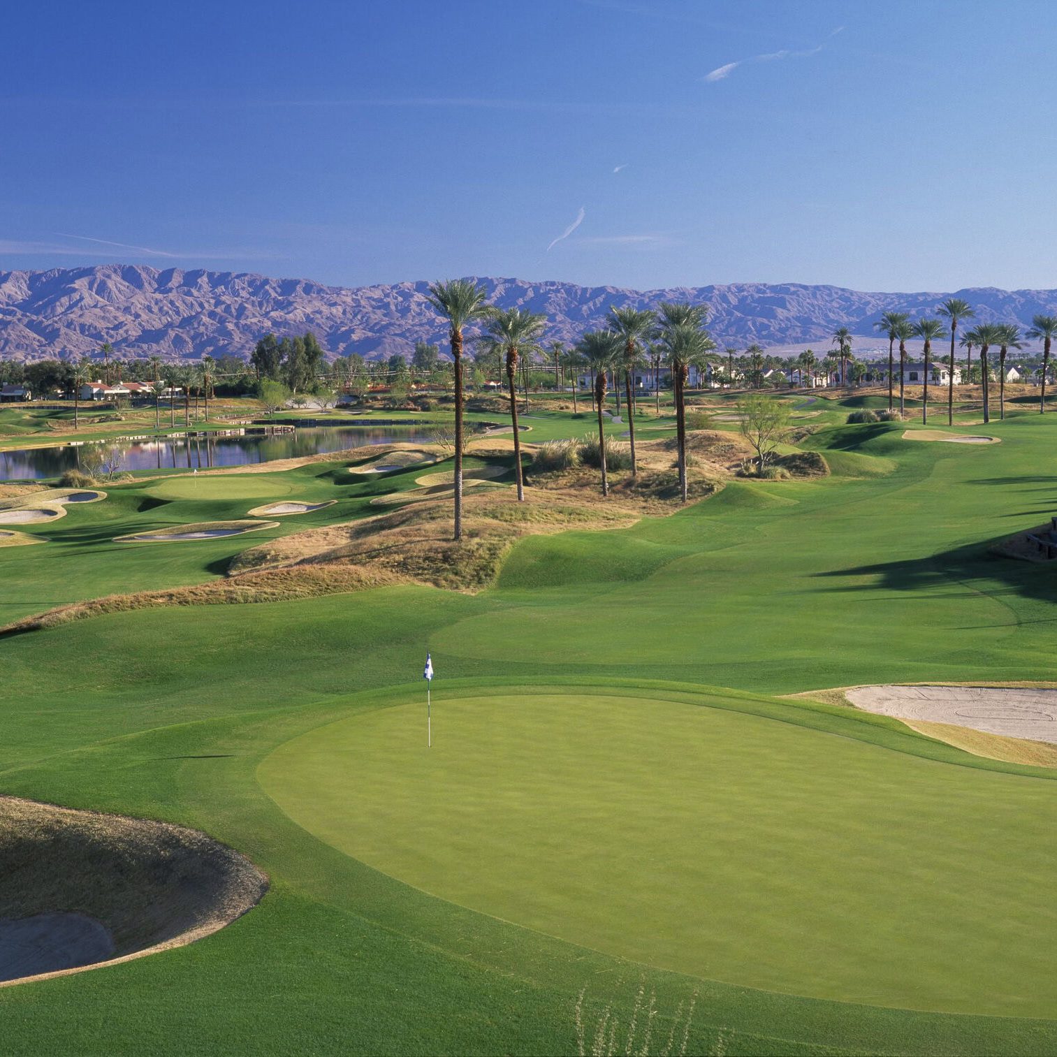 Scenic view of La Quinta Resort golf course with mountains in background.