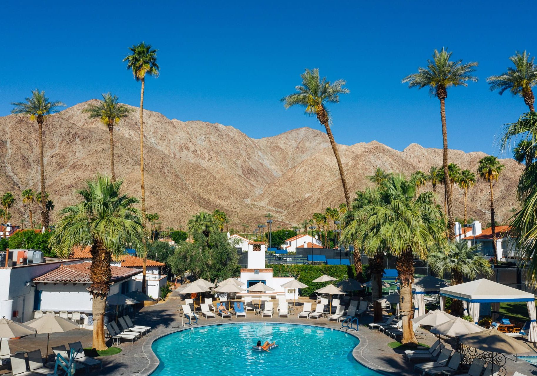 Pool at La Quinta Resort & Club with mountain views.